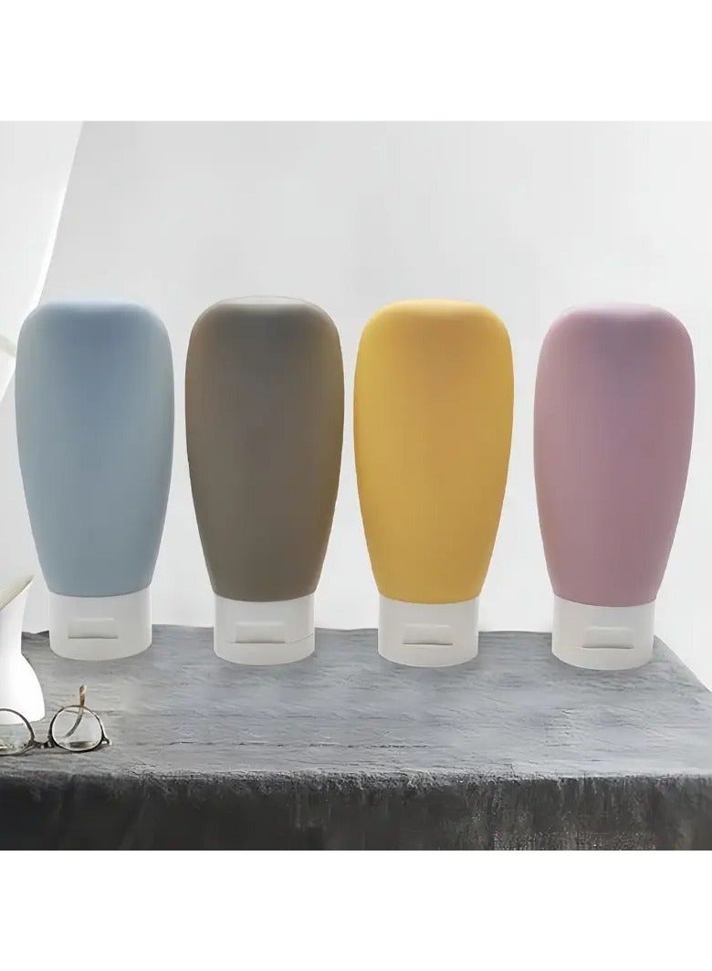 4pcs/set Travel Bottles Set, Refillable Cosmetic Containers Empty Shampoo Shower Gel Tubes For Toiletries Shampoo And Body Wash Liquid Travel Bottles Lotion Sub Bottle Squeezable Containers 60ml(blue, gray, yellow, and pink)